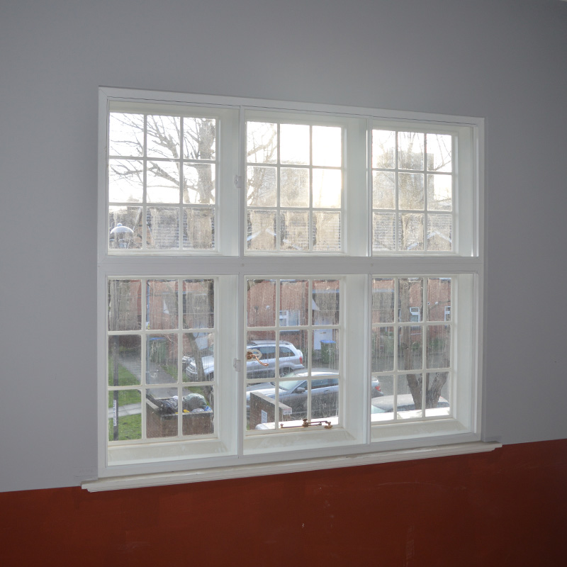 Selectaglaze Series 10 3-pane horizontal sliders with fitch catch in the Plumstead Library stairwell