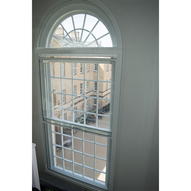 Large motorised vertical sliding secondary glazing at Outpatients building Oxford University