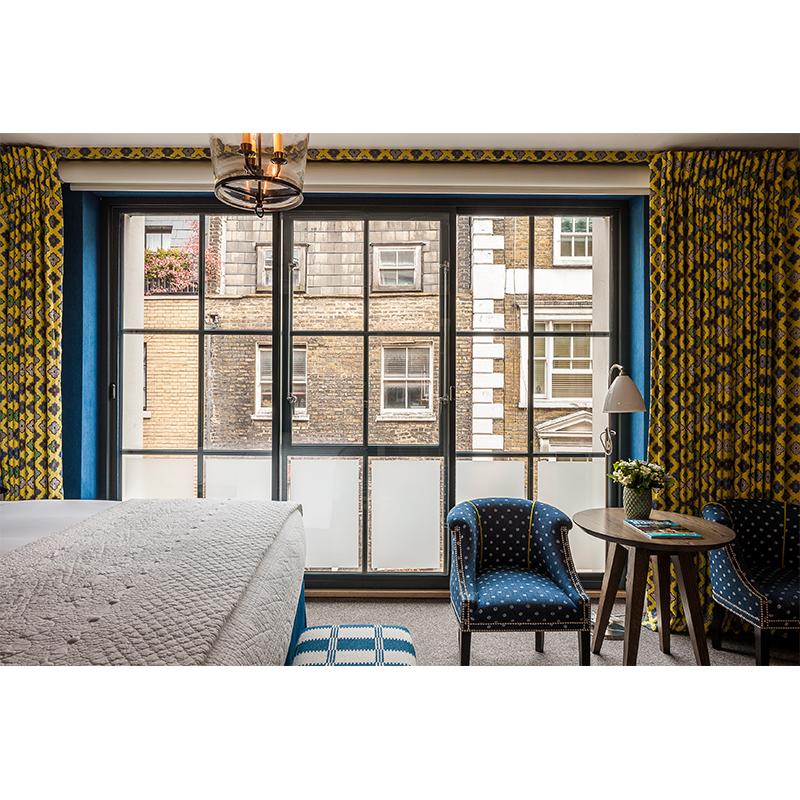 Secondary glazing for noise reduction in Soho, installed in Ham Yard Hotel