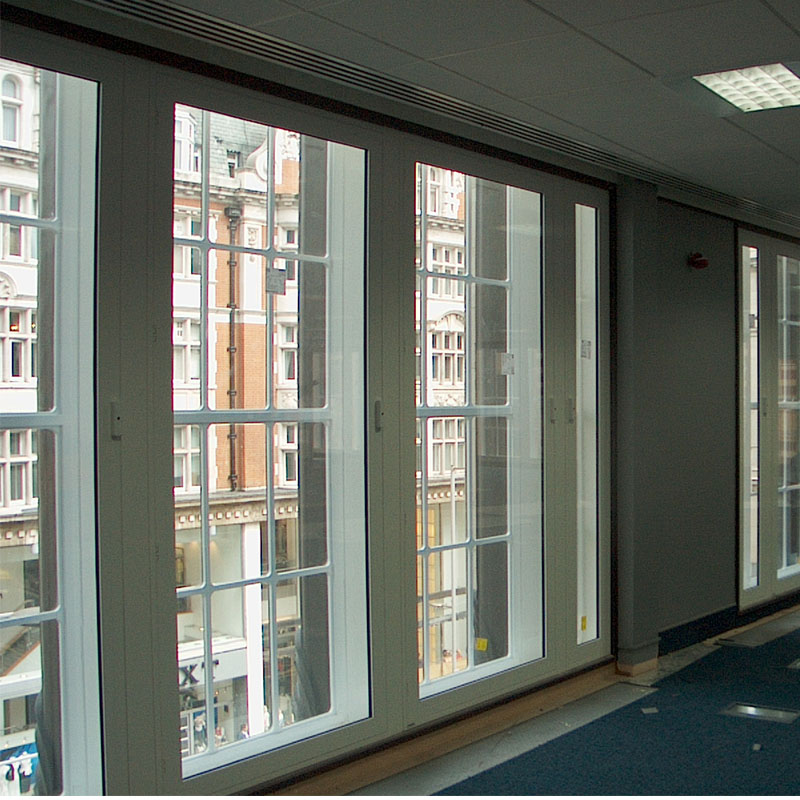 Large secondary double glazed hinged casement doors with rosette lock