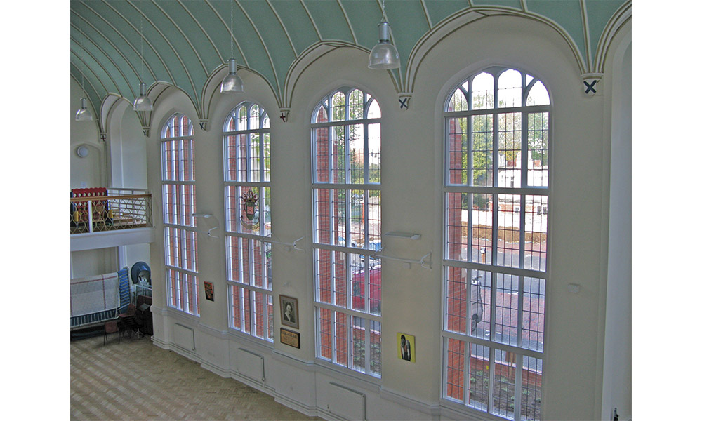 Combined secondary glazing arched and standard units at Abbey School reading