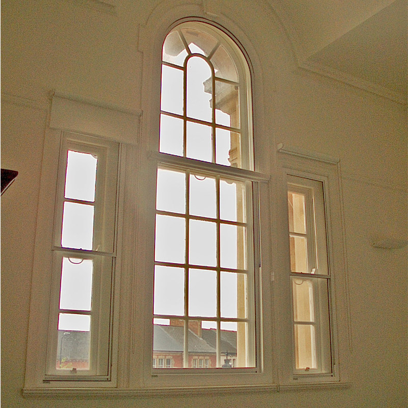 Feature art deco style windows at Barry Town Hall, Wales with Selectaglaze secondary glazing