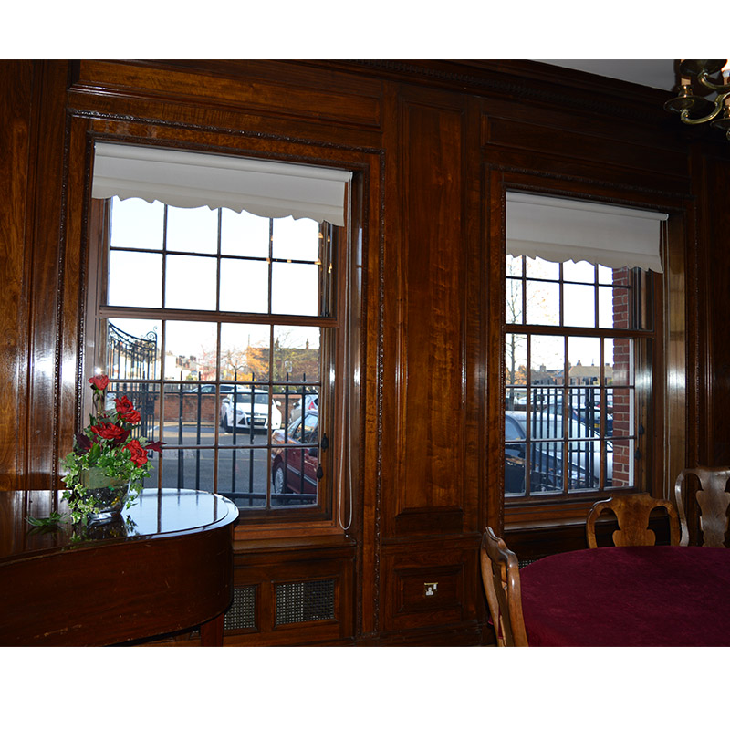 Braintree Town Hall meeting room with wood grain effect Selectaglaze secondary glazing