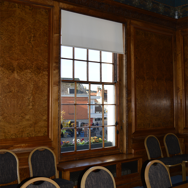 Wood panelled function room at Braintree Town Hall with wood grain effect secondary glazing from Selectaglaze