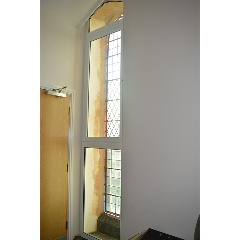The tall lancet window in Hindmarsh Hall, treated with the build up of three separate units; the bottom pane was a series 40 fixed light, centre panel was a series 41 side hung casement and top panel was a gothic arched series 40 fixed light