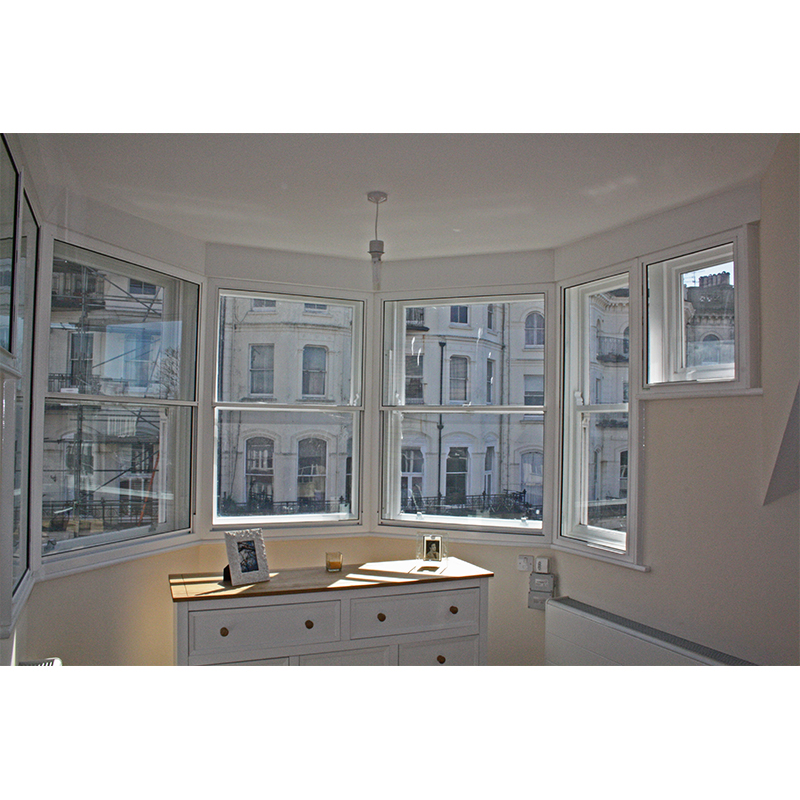 Bedroom windows with secondary panes added to improve the thermal performance
