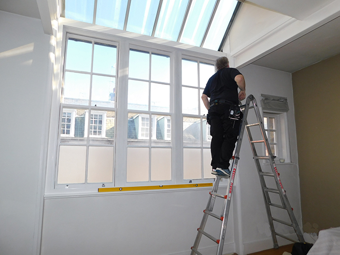 Fixing of the timber sub frames in a window opening to allow the installation of a secondary glazed unit
