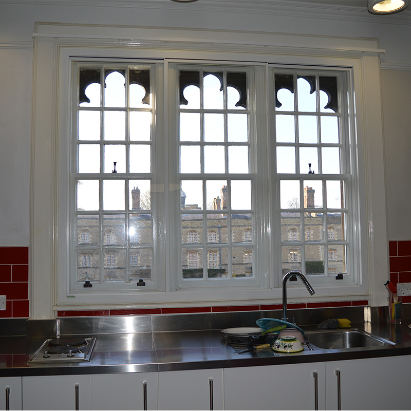 Secondary glazing in Jesus College researchers kitchen. Thermal improving windows with low-E glass