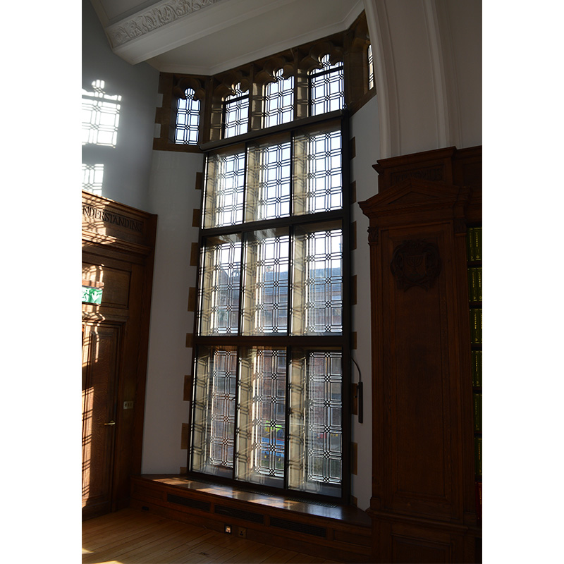 Cambridge University, Webb Library. Large feature windows glazed with heat retaining and draught excluding secondary glazing