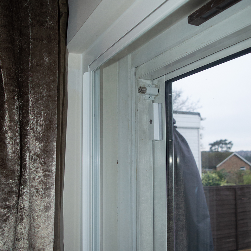 Series 10 horizontal slider installed by Selectaglaze to compliment patio doors in a family home in Cockfosters
