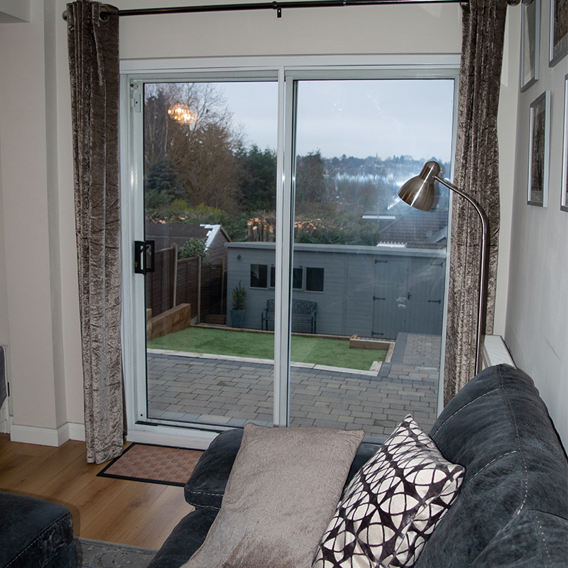 Selectaglaze installed Series 10 horizontal sliders to insulate patio doors at a family home