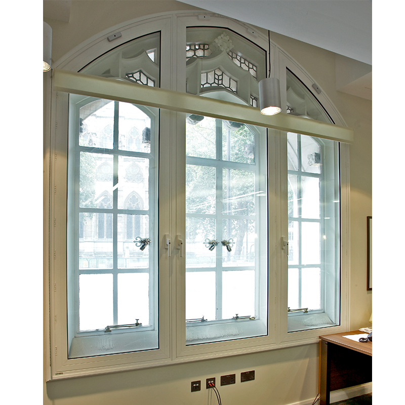 Arched secondary glazing series 50 hinged casement in the Supreme Court admin office