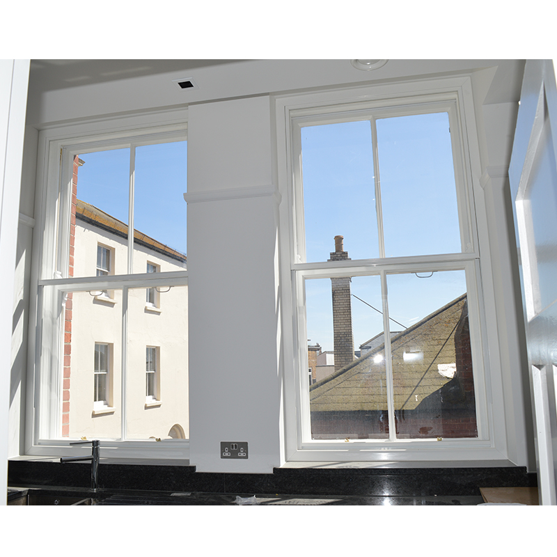 Secondary glazing to make the kitchen and living area warmer for occupants
