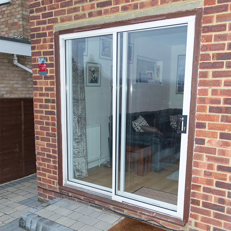 Discreet secondary g;azing to patio doors as viewed from the exterior - Selectaglaze series 10 horizontal sliding doors