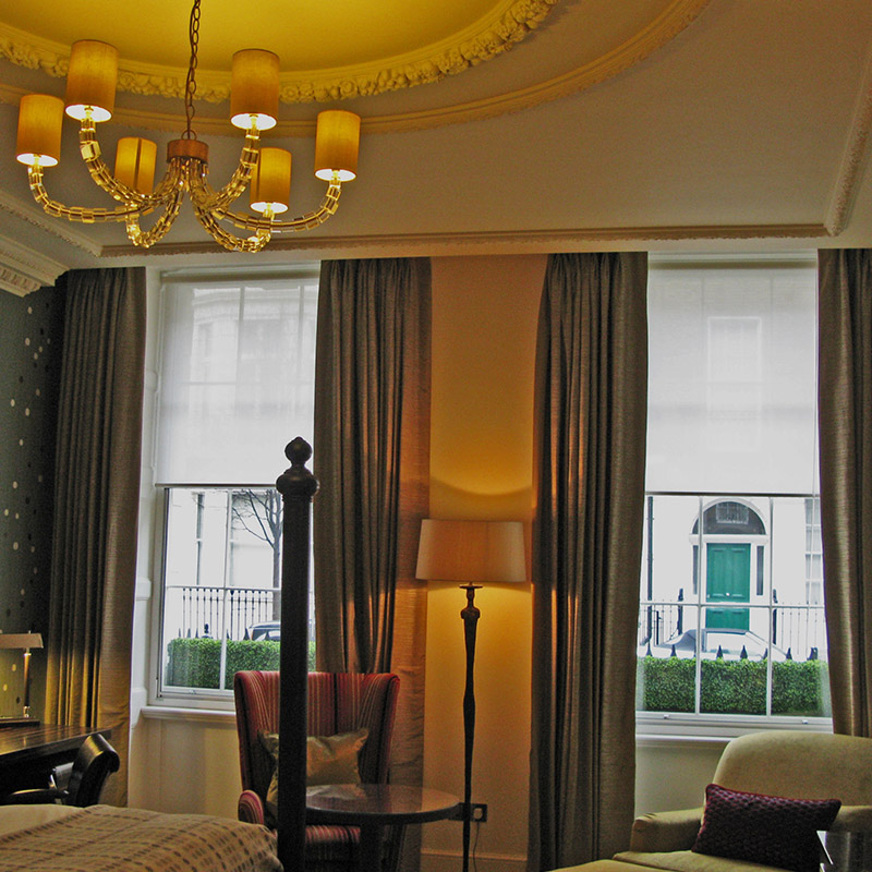 Installation of secondary double glazing in a bedroom suite of The Arch Hotel