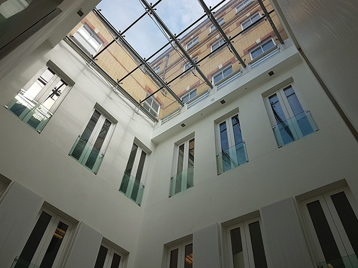 Selectaglaze installed Series 41 units to help provide noise insulation to casement doors overlooking an atrium in an office building in central London
