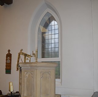 Gothic arched secondary glazing at Jesus Church in Troutbeck