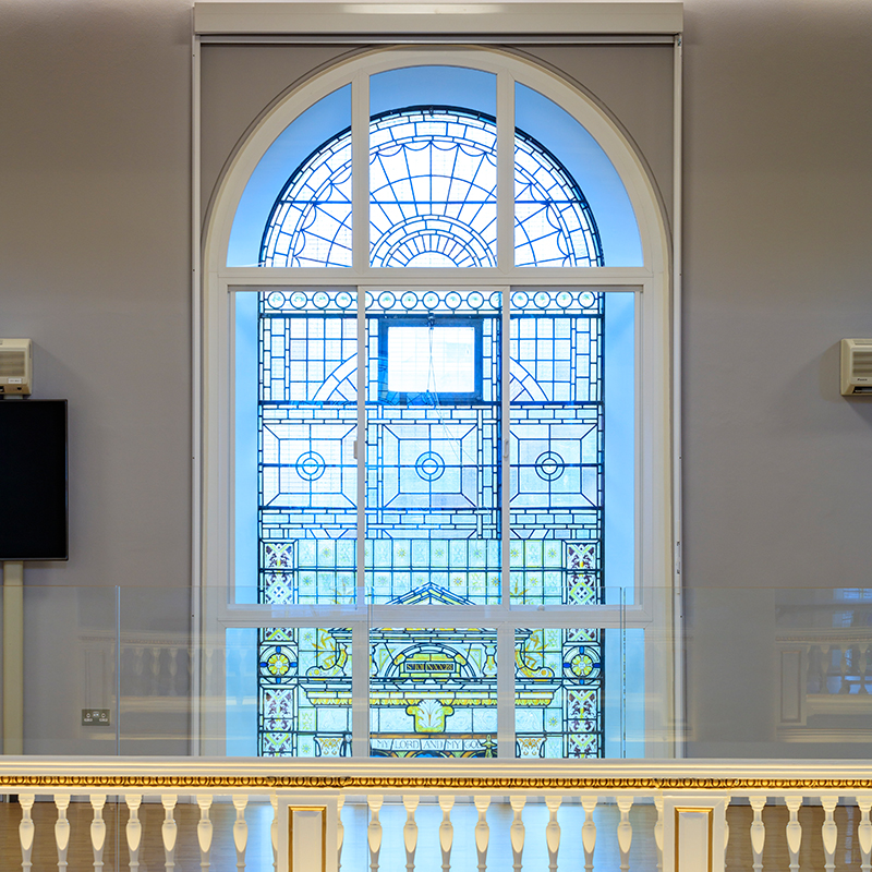 Large arched head secondary glazing series 80 3 pane horizontal slider and series 42 fixed light