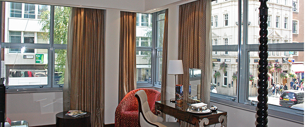 Duel aspect windows at the Indigo Hotel with grey powder coated acoustic secondary glazed frames