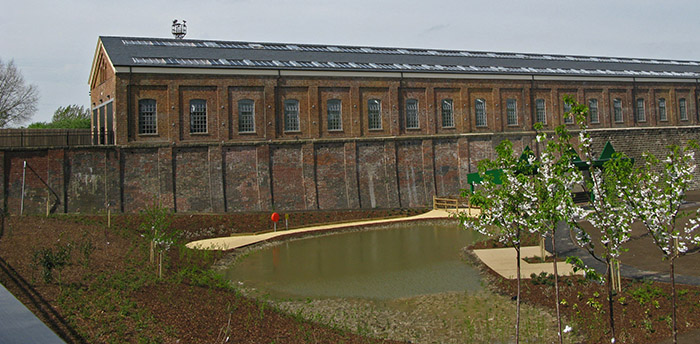 The Former Royal Train Shed at Wolverton Park whihch has been converted to apartments and homes, with the addition of secondary galzing to make the Victorian windows more sustainable and energy efficient