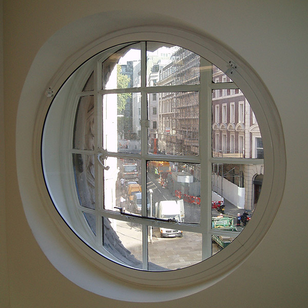 One centred circular secondary glazing Kings House