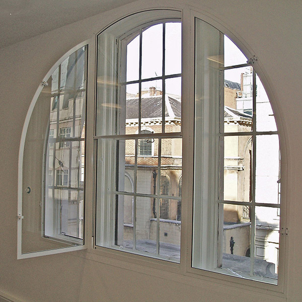 One centred full radius head secondary glazing to Kings House