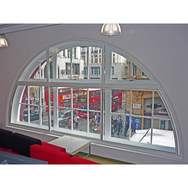 One centred full radius head secondary glazing to Oxford House