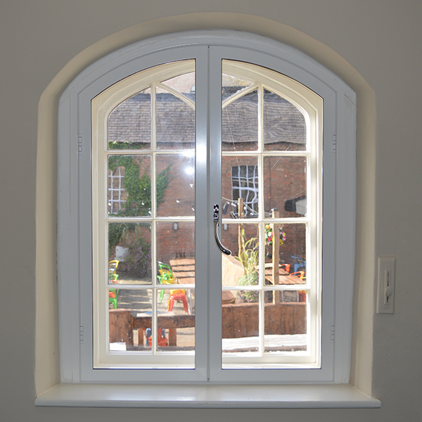 One centred segmented head secondary glazing Old Toll House