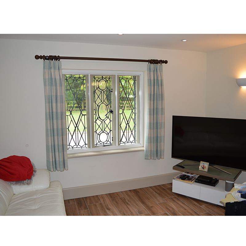 Leaded light windows in bedroom with Selectaglaze secondary glazing