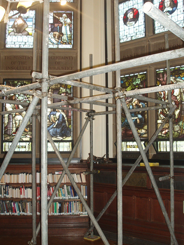 The scaffolding build up to ensure a safe installation of Selectaglaze secondary glazing for these large gothic arched stained glass windows