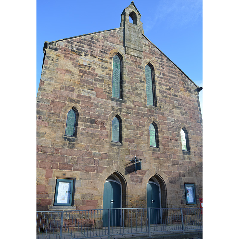 The external facade of Hindmarsh Hall, Alnmouth which had the lancet windows treated with internal sealed unit secondary glazing by Selectaglaze