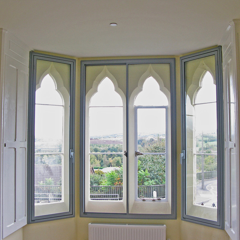 Beautiful gothic arched primary doors treated with Selectagalze secondary glazing