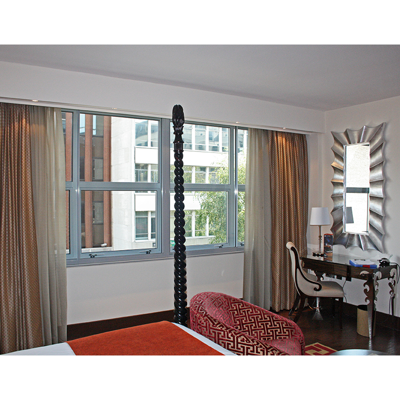 Secondary glazing for noise reduction in bedroom at Indigo Hotel