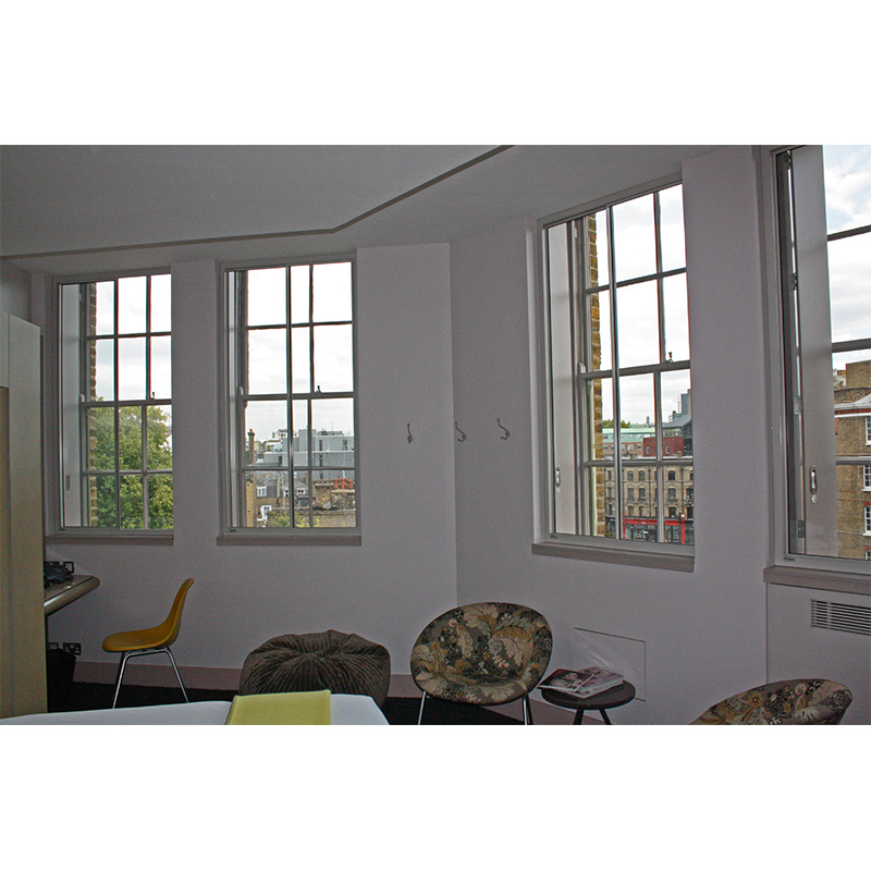 Zetter Hotel bedroom with secondary glazing for noise insulation