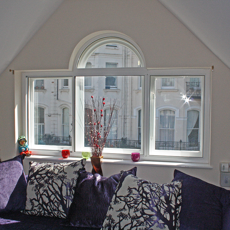 Feature window in Vernon Gardens flats with a secondary glazing installation