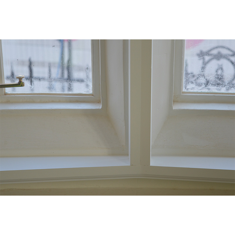 Installed timber sub frames with curved back and square face, ready to accept the secondary glazing fixing in the bow windows facing Plumstead High Street in the newly reopened and refurbished library