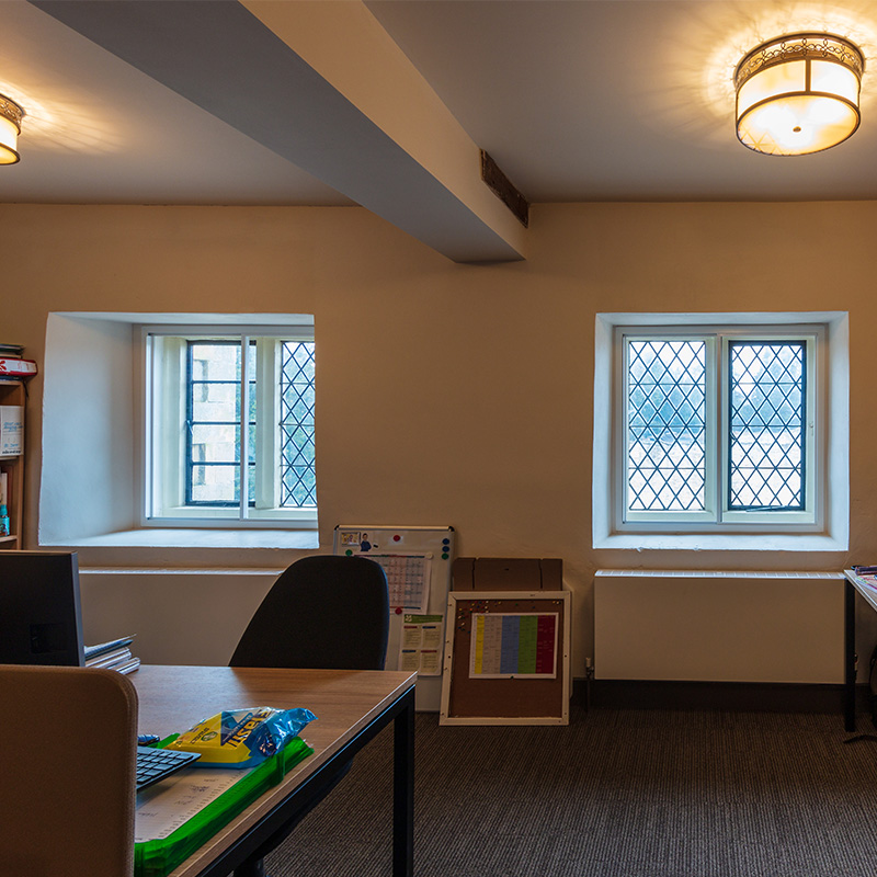 Selectaglaze Series 10 horizontal sliding unit with leaded light primary window at Grade I Listed Belton Stables