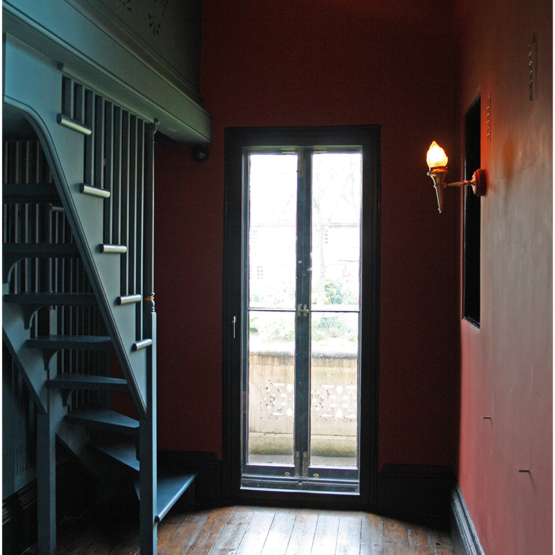 Hinged casement opening to original doorway - Leighton House museum