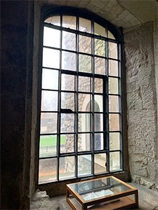A norman romanesque window in the Jewel Tower, Westminster London - English Heritage