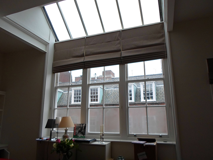 A large primary window with 3 sliding box sash windows, which required Selectaglaze secondary glazing for thermal improvements