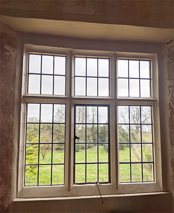 An example of a heritage primary single glazed window with splayed reveals