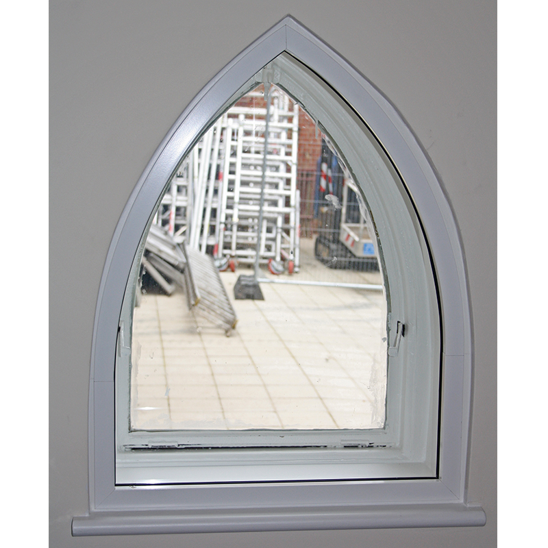 Small arched window at St Pauls Church with Selectaglaze secondary glazing