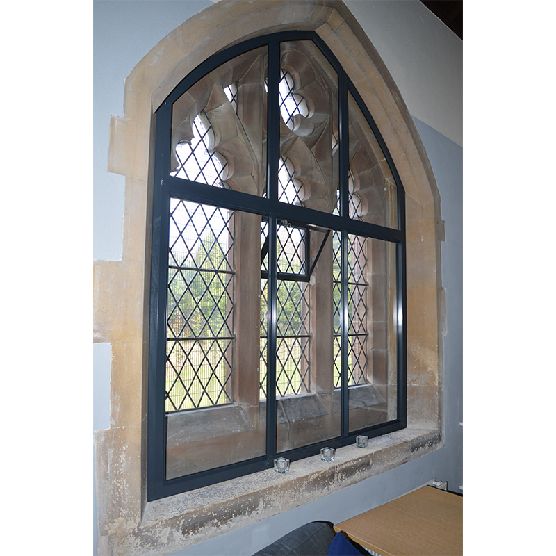 Black gothic arched secondary glazing at St Philips Church Wolverhampton