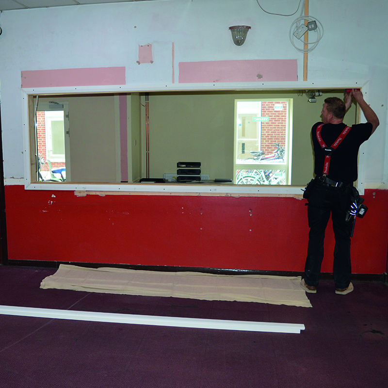 Selectaglaze installers fixing the timber sub frame at Caritas House, London
