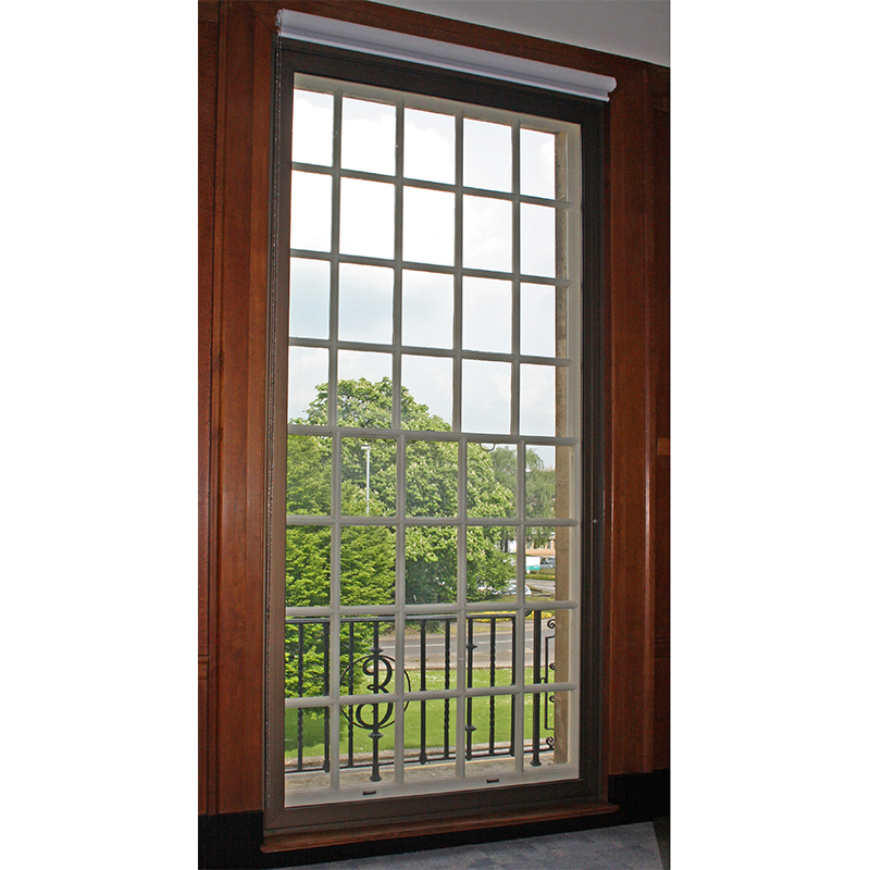 Wiltshire County Hall with wood grain effect secondary glazing for thermal retention which reduces energy bills